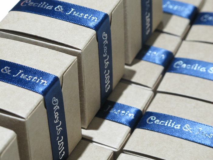 Challenged Athletes Foundation - navy ribbons on Kraft boxes (modern style), back view with our chocolate wedding favors.