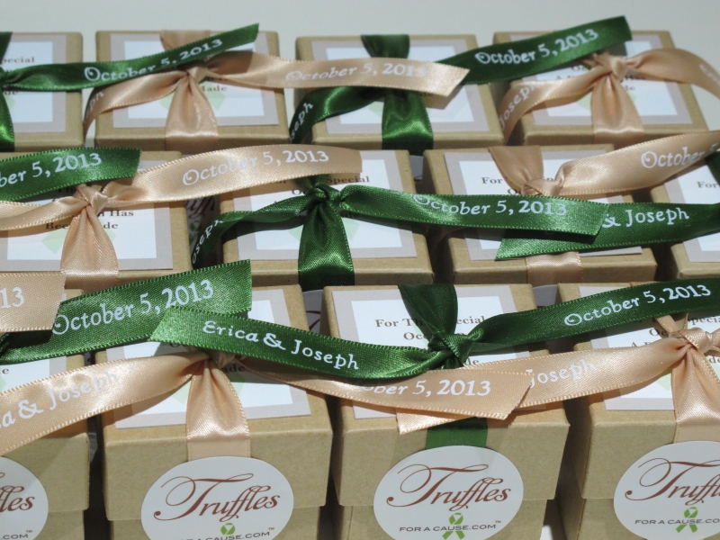Leaf & raw silk ribbons  on kraft favor boxes with chocolate raspberry truffles inside.