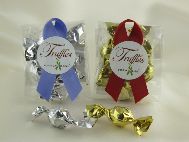 Mini Favors display with iris & scarlet ribbons and silver & gold chocolate mini truffles.